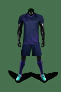 Full soccer uniform set with purple geometric jersey and shorts on mannequin