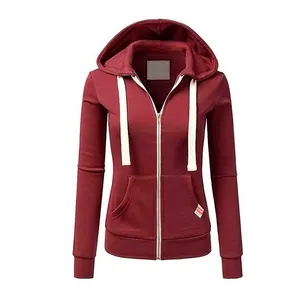 Slim fit women's maroon zip-up hoodie sweatshirt with white drawstrings and pockets.