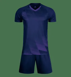 Navy blue and purple soccer jersey set with geometric pattern for football training.