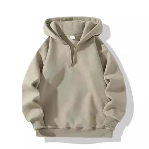 Heavyweight oversized half-zip beige hoodie with cozy fleece lining and ribbed cuffs
