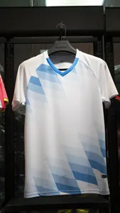 White football jersey with blue geometric pattern and V-neck for sports training.