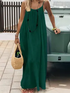 Elegant dark green pleated backless maxi dress perfect for stylish summer beach vacation