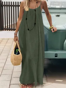 Summer backless olive green camisole maxi dress with pleated texture and straw bag