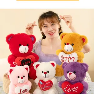 Colorful Valentine's heart teddy bear plush toys set shown with an Asian model.