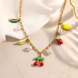 Detailed view of gold stainless steel necklace with colorful fruit charms and pearls