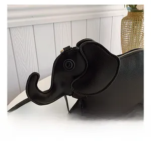 Detailed side view of a black elephant-shaped PU leather crossbody bag for women.