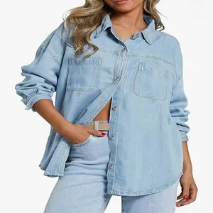 Close-up of a stylish women's light blue washed denim jacket with double chest pockets