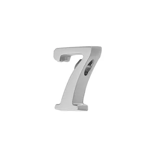 Detail of a silver stainless steel number 7 pendant with a high-polished finish.