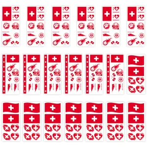 Detail view of various Switzerland flag temporary tattoo stickers for football fans