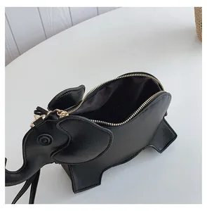 Internal compartment detail of a cute black elephant shaped PU leather crossbody bag
