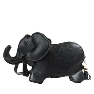 Detailed side view of a black elephant-shaped PU leather crossbody bag with tassel