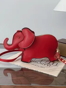 Exquisite red elephant shaped PU leather crossbody shoulder bag with tassel charm