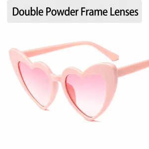 Fashionable pink heart-shaped sunglasses with pink gradient lenses for women