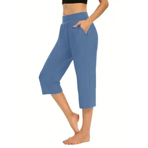 Women's comfortable loose blue capri pants with a functional side pocket detail.