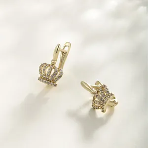 Elegant gold-tone crown hoop earrings with sparkling cubic zirconia.