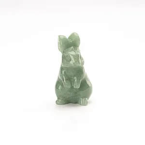 Hand-carved green crystal rabbit figurine, natural gemstone bunny statue for home decor.
