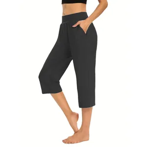 Macro view showing the side pocket detail of black women's cropped sports pants.