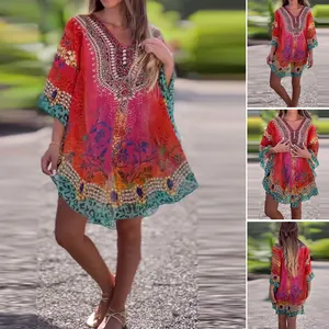 Detailed views of ethnic print V-neck tunic blouse with vibrant bohemian patterns