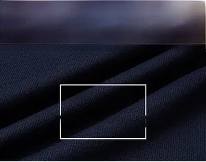 Detailed macro view of high-quality navy blue breathable knit fabric for men's hoodies