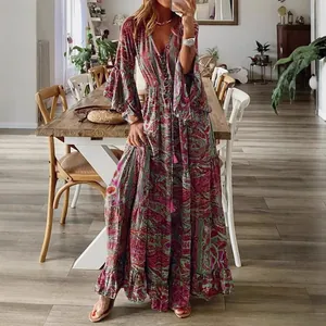 Robe maxi bohème à motif cachemire, col en V et manches trompette pour femme