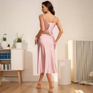 Elegant pink satin slip nightdress for women, soft loungewear for home relaxation.