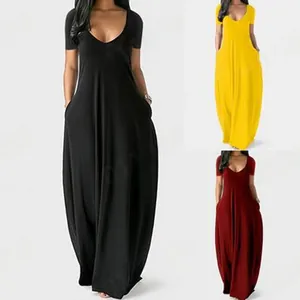 Close-up detail of the short sleeve V-neck maxi dress in black, yellow and burgundy