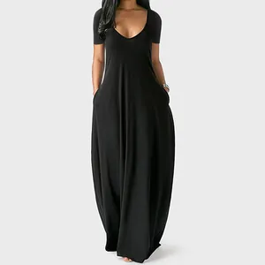 Elegant black maxi dress with a deep V-neck and functional side pockets detail view.