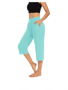 Comfortable women's solid color loose casual cropped pants with pockets in light blue