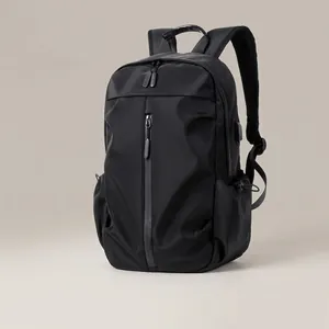 Simple black men's casual backpack with laptop compartment for travel and school