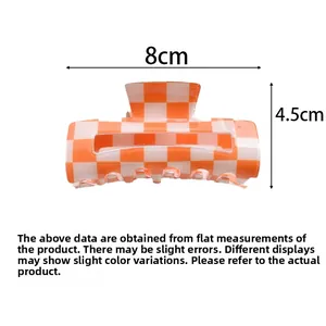 Orange checkered hair claw clip measurement details 8cm x 4.5cm overview