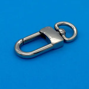Close-up of a polished stainless steel swivel lobster clasp on a blue background