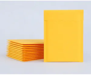 Detailed view of yellow padded kraft bubble envelopes for secure shipping