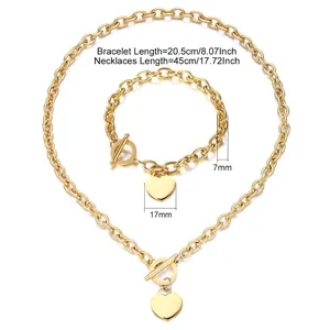 Ensemble de bijoux en acier doré avec pendentif cœur et fermoir à bascule
