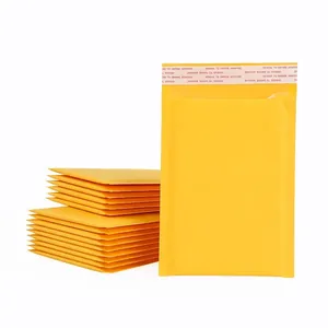 Durable yellow Kraft paper bubble mailers for secure shipping and protective packaging.