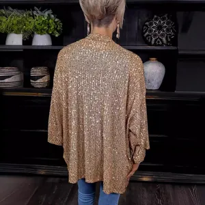 Glamorous women's gold sequin oversized loose cardigan top shown from the back view.