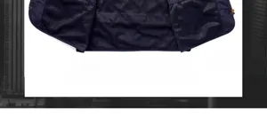 Macro detail of breathable mesh lining on a professional navy blue outdoor utility vest