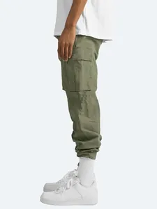 Side view of olive green cargo pants for men featuring large utility side pockets