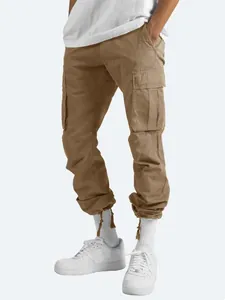 Detail shot of men's khaki cargo pants with side pockets and drawstring cuffs
