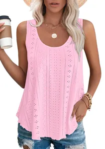 Detailed view of a light pink sleeveless top featuring intricate eyelet lace embroidery
