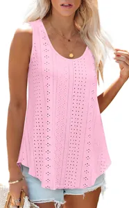 Close-up detail of pink sleeveless top with intricate perforated eyelet pattern and round neck