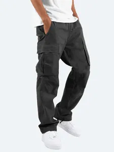 Detailed view of black men's cargo pants featuring multi-pocket design and drawstring hem
