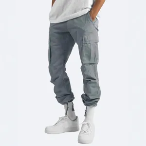 Stylish men's grey cargo pants featuring multi-pockets and adjustable drawstring cuffs
