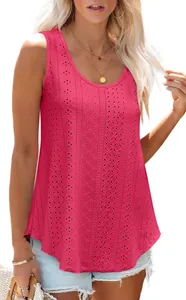 Detailed view of women's sleeveless hot pink tank top featuring intricate eyelet embroidery
