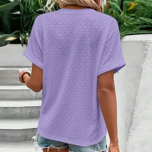 Back view of a light purple short-sleeved t-shirt with delicate eyelet pattern texture