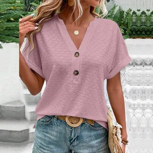 Close-up view of the mauve textured V-neck tee with button details