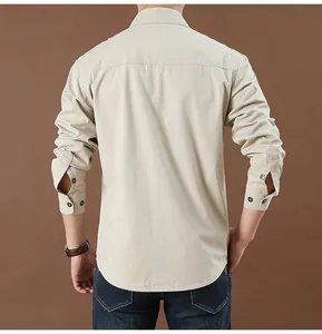 Back view of men's casual beige long sleeve shirt with curved hem detail and button cuffs
