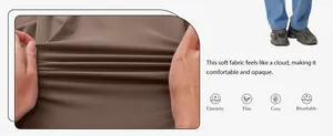 Close-up detail of soft milk silk fabric showing high elasticity and breathable texture
