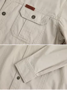 Detail of men's cargo shirt showing pocket with 'OUTDOOR' patch and button cuff.