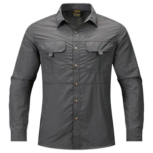 Front view of a dark grey men's long-sleeve casual shirt featuring dual utility flap pockets