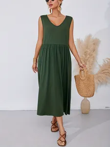 Detail view of stylish dark green sleeveless V-neck maxi dress with gathered waist